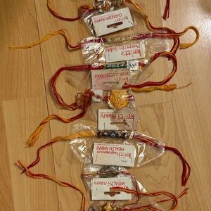 Traditional Rakhi Set with Red and Yellow Threads